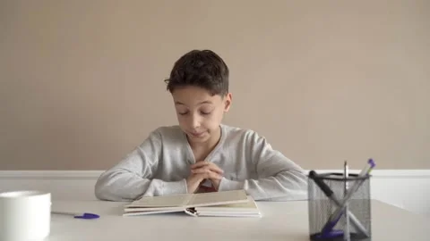 School boy having trouble with his homework. Видео 142032758