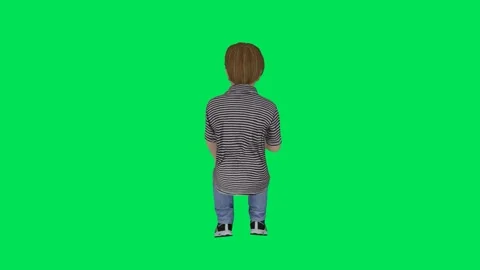 School boy is shaking his legs in a sitting position from the back angle Stock-Footage 246731187