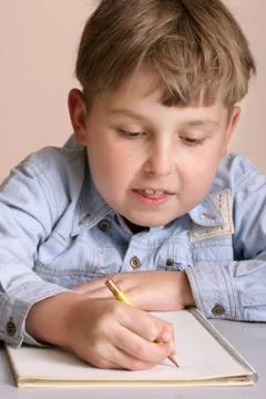 School boy student doing schoolwork Stock Photos
