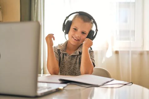 School boy using laptop. Stock Photos