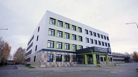 School building features facade with checkered tiles Видео 333211254