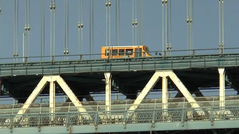School Bus Crossing Manhattan Bridge Slow Motion Stock Footage 121102001