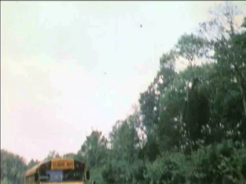 A school bus driver thinks about safety as he drives schoolchildren to school Stock Footage 75267722