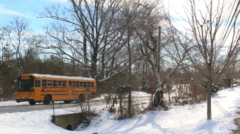 School Bus Drives in Winter Stock Footage