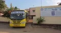 School bus leaving the schoolyard in India HD Footage
