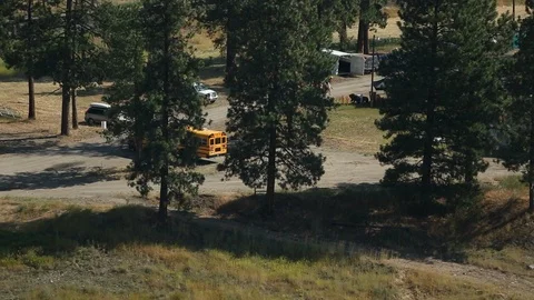 School Bus Pulling into River Landing on Clark Fork River Stock Footage 105981920