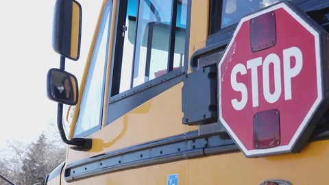 School bus stop paddle being extended Video stock 72880906
