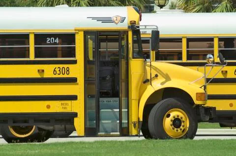 School busses Stock Photos