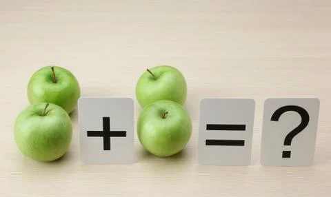 School card and apple with math problems 스톡 사진