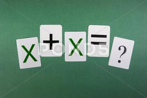 School card with math problems on the green background Stock Photos