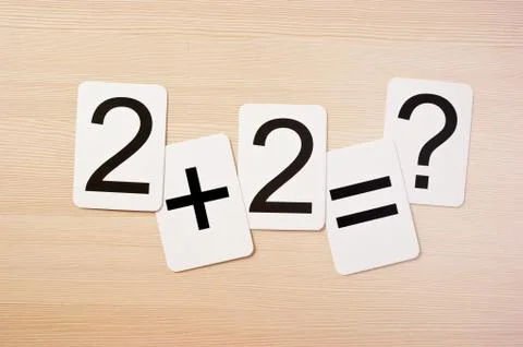 School card  with math problems on the table 写真素材