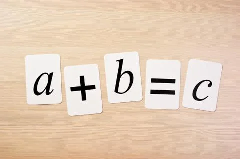 School card  with math problems on the table Foto stock