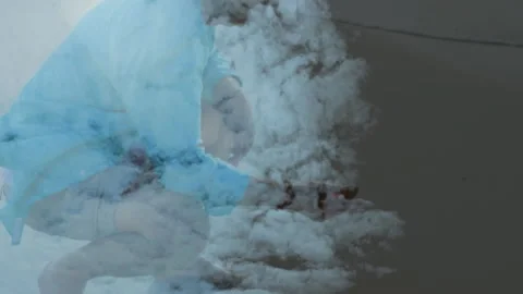 In school, child creating animation with fluffy cloud-like formation on computer Video stock 303447809