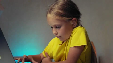 School child typing text on laptop Stock Footage 161418695