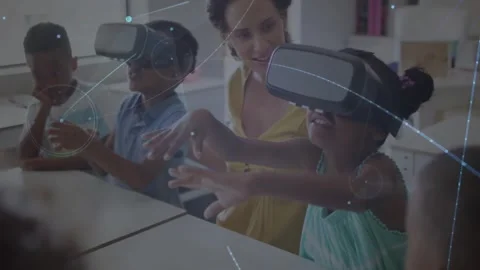 In school, children and teacher using VR headsets for animation exploration Stock Footage 328932307