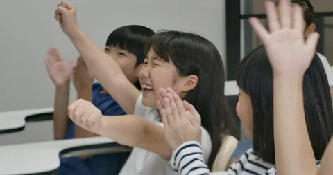 School children answer questions in clas... | Stock Video | Pond5