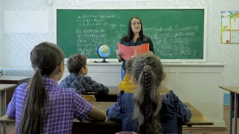 School children in classroom at lesson Video stock 117319718