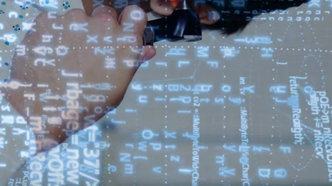 In school, children interacting with animation and digital code in classroom Stock Footage 313171015