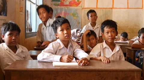 School children learning in classroom 4k Cambodia Asia happy smiling Video stock 56640018