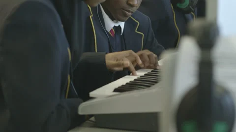 School children learning music Stock Footage