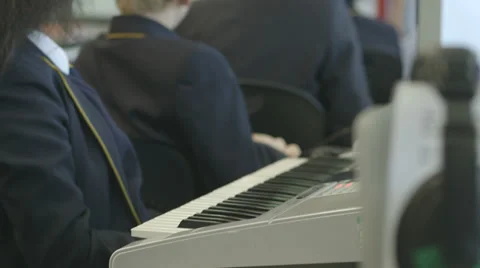 School children learning music Stock Footage 32697022