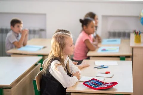 School children participating actively in class. Education, learning, high 스톡 사진