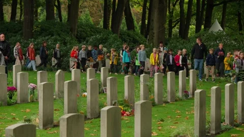 School Children Procession at Arnhem Oosterbeek War Cemetery Stockbeeldmateriaal 331378401