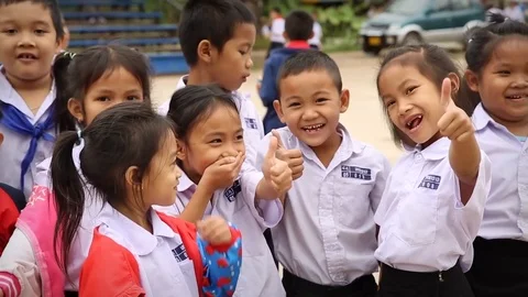 School children smiling for the camera in Laos Stock Footage 104121293