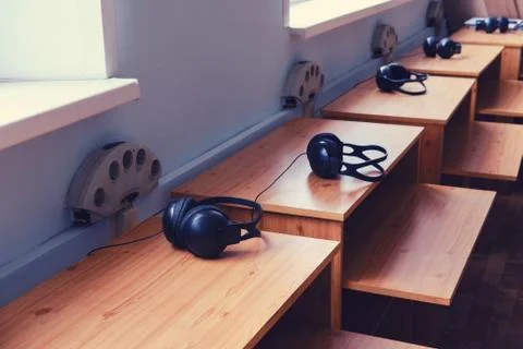 School class without computers with empty desks and headphones Stock Photos