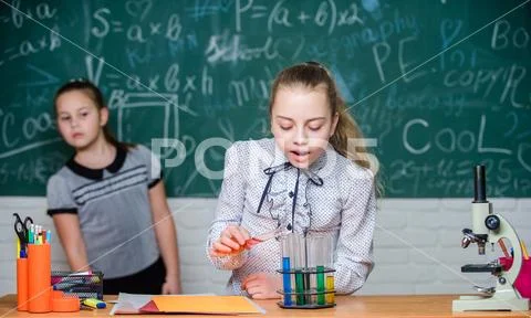 School classes. Biology and chemistry lessons. Observe chemical reactions Stock Photos