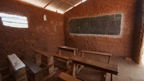 School classroom in building made of clay and sticks without doors and with roof Vidéo 301867841