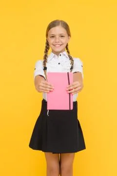 School club after classes. Study foreign language. Essay for homework. KId girl Stock Photos