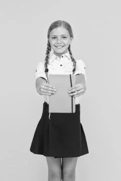 School club after classes. Study foreign language. Essay for homework. KId girl Stock Photos