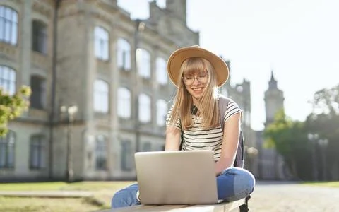 School, college or student using laptop outdoor in campus Stock-Fotos