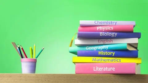 School colourfull textbooks on the table. Basic school subjects mathematics, Stock Photos
