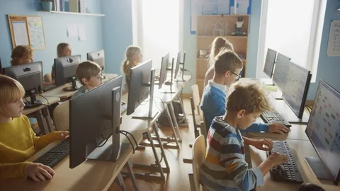 School Computer Classroom: Diverse Group of Little Smart Schoolchildren using PC 스톡 동영상 119360021