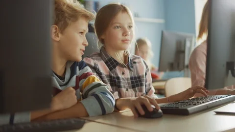School Computer Science Classroom Portrait of a Girl, Boy Talking while using PC 스톡 동영상 119359977