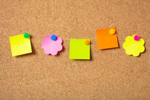 School concept. Five sticky notes in various shapes with pushpins and blank s Stock Photos