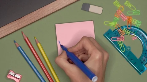 School concept. Womans hand writing WEEKEND on notepad Stock Footage 99730842
