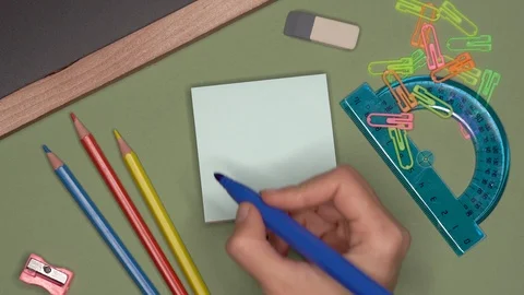 School concept. Womans hand writing ENGLISH on notepad Stock Footage 100108802