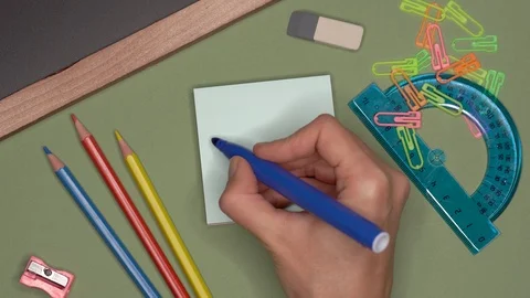 School concept. Womans hand writing ALGEBRA on notepad Stock Footage 100109367