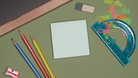 School concept. Womans hand writing IDEA on notepad Stock Footage 101842966