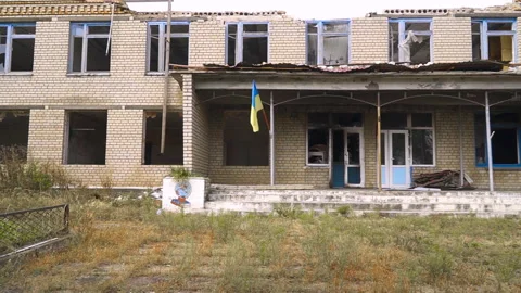 A school damaged by shelling Stock Footage 255125507