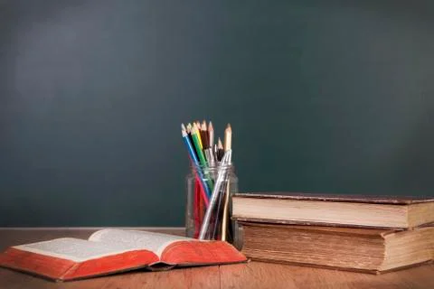 School desk with blackboard Stock Photos