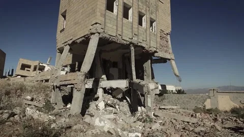 A school destroyed by the war and violent fighting in Yemen, Taiz Stock Footage 197048438