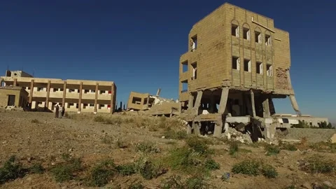 A school destroyed by the war and violent fighting in Yemen, Taiz Stock Footage 197048489