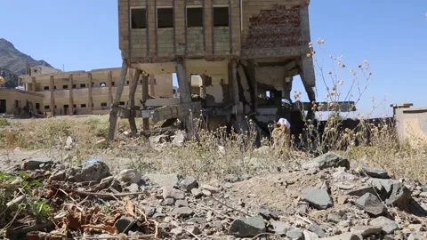 A school destroyed by the war and violent fighting in Yemen, Taiz Stock Footage 197048767