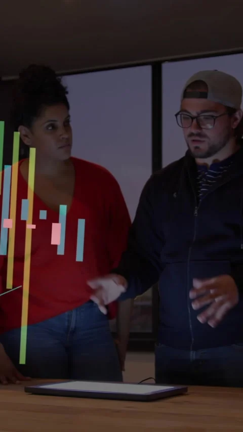 In school, diverse team analyzing animation data visualization on tablet Stock Footage 319157374