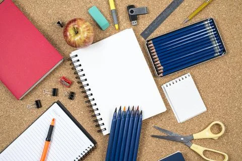 School elements on cork background with space for text symbolizing back to .. Stock Photos