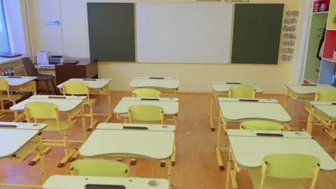 School empty classroom with white and green blackboard, educational Vidéo 228887633